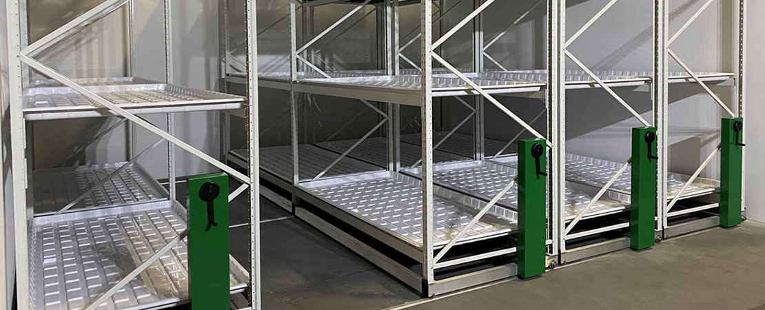 Product images of Mobile Carriages for growing cannabis on a vertical grow rack system.