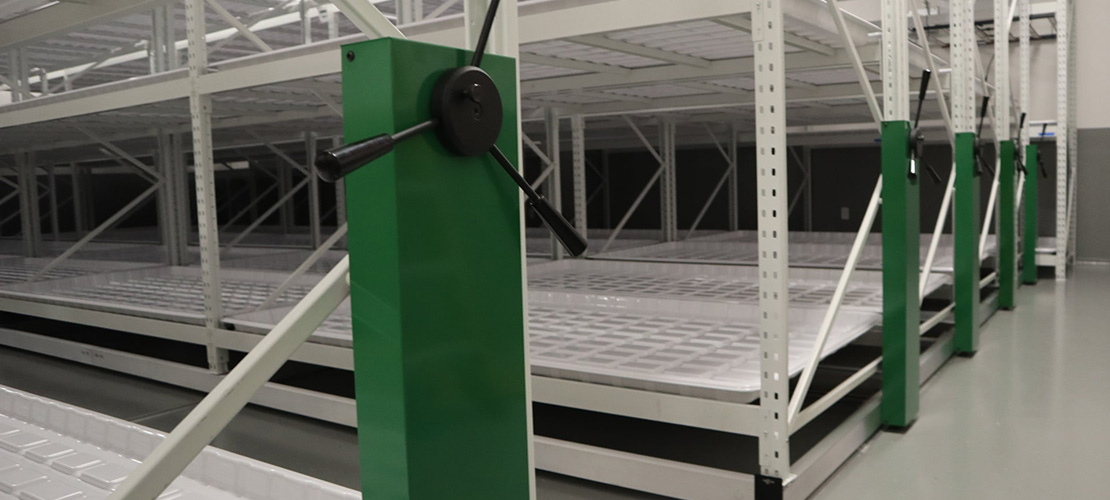 Image of Rolling Vertical Grow Racks for commercial cannabis grow operations and grow rooms. Buy vertical shelves and rolling shelving.